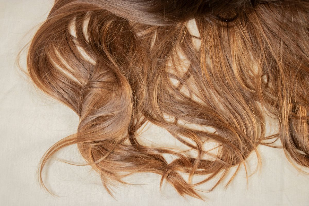 Brown hair spread out.